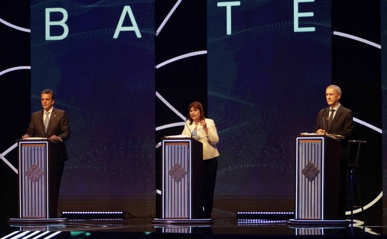 Los candidatos presidenciales, en el primer debate.