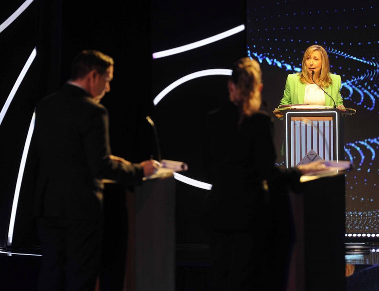 Los candidatos presidenciales, en el primer debate.
