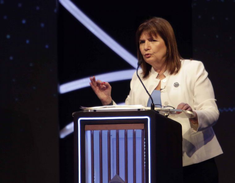 Los candidatos presidenciales, en el primer debate.