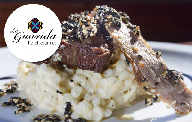 La Guarida: Solomillo de cerdo sobre maíz blanco