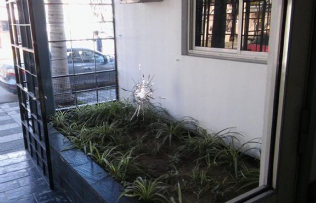 Balazos en sede de estaciones de servicio