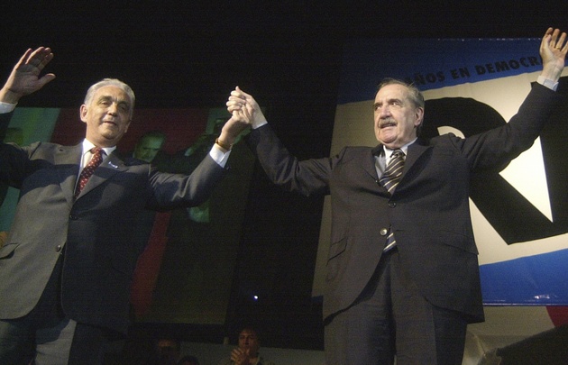 Víctor Martínez y Raúl Alfonsín.