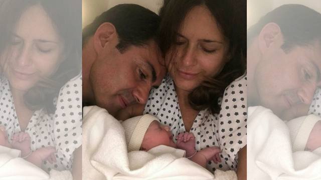 Urtubey y Macedo, junto a su pequeña hijita.