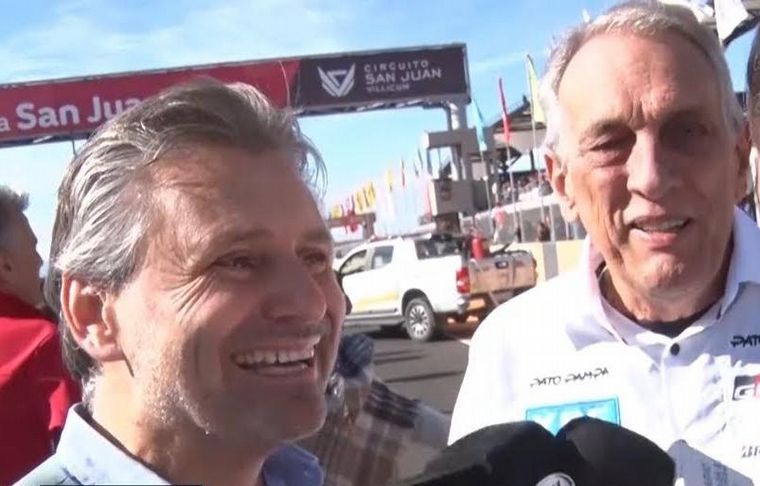 Juan María Traverso, junto a Marcos Di Palma