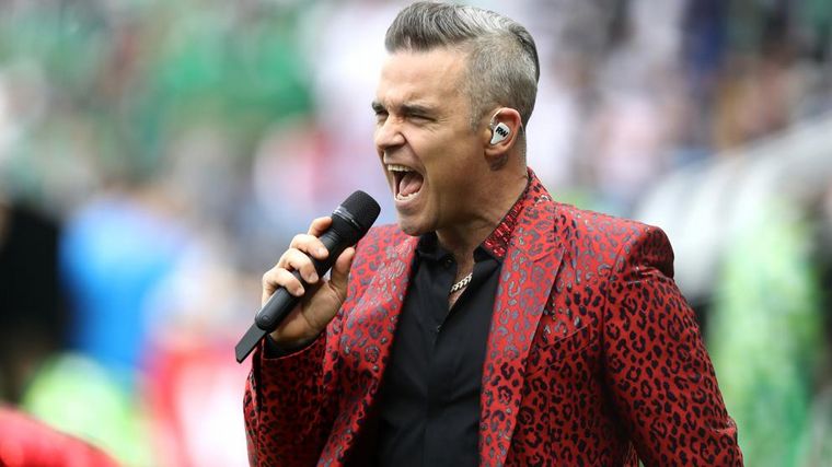 FOTO: Robbie Williams presentó su nueva canción navideña.